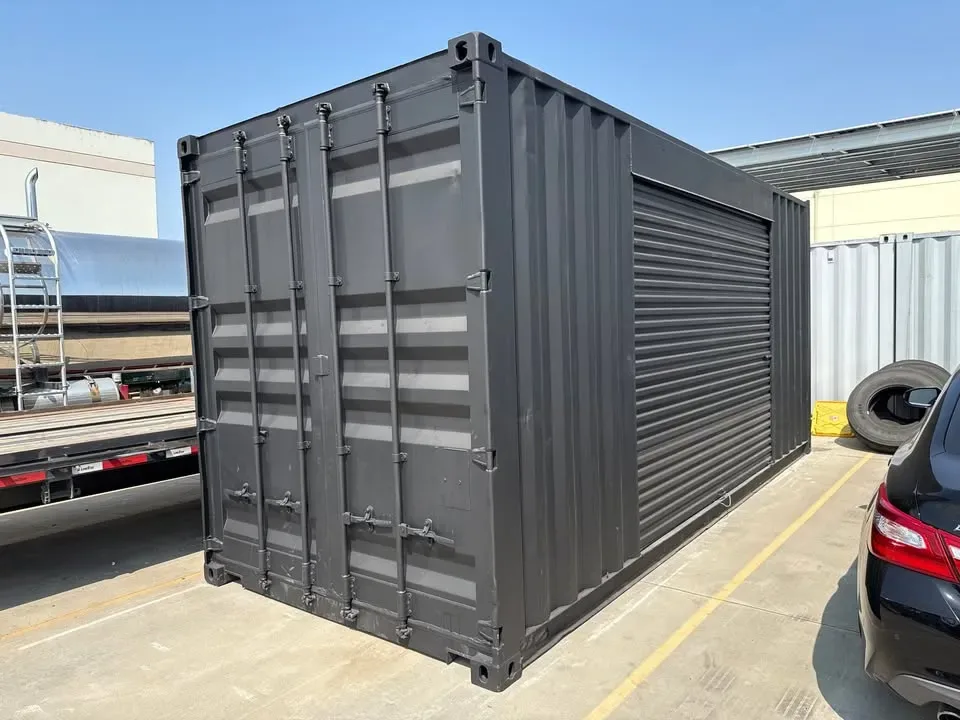 20ft Used Shipping Container - Matte Black w/ 12 Side Roll-Up Door for sale at Pauls Containers Ltd